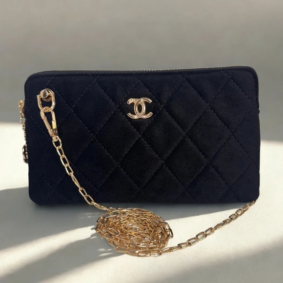 CHANEL Handbags - Chanel Black Quilted Clutch with Gold Accents